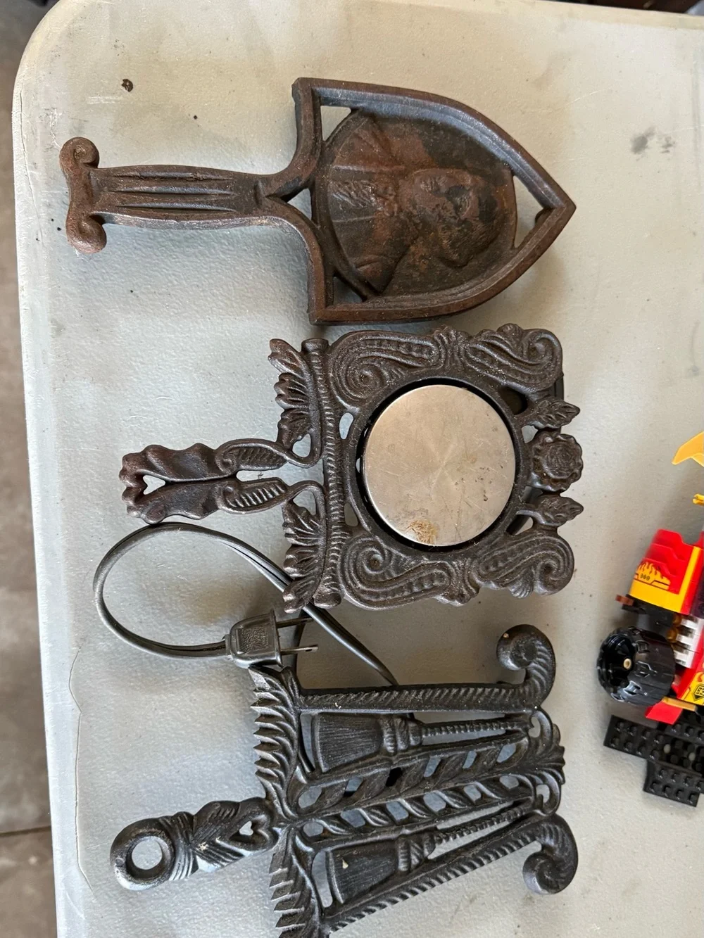 Antique-Style Cast Iron Decorative Wall Accent in Dark Brown